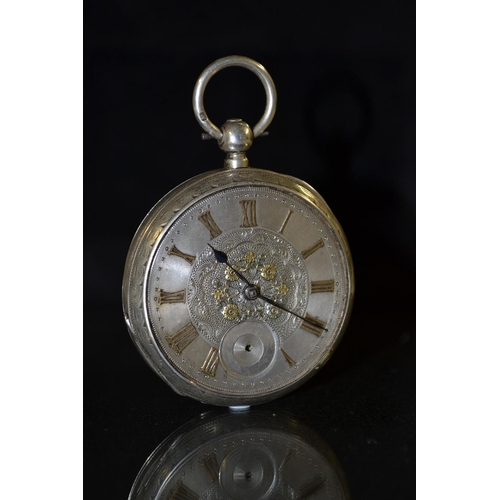 3125 - A 19th century continental 935 silver open face pocket watch, floral inlaid silver dial, raised Roma... 