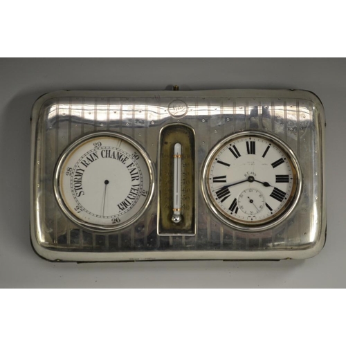 3134 - An Edwardian silver mounted green leather travelling deck top clock barometer thermometer, the silve... 