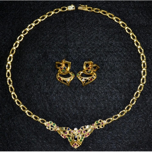 3156 - A diamond, emerald, ruby and sapphire mounted 18ct yellow gold necklace and earring three piece suit... 