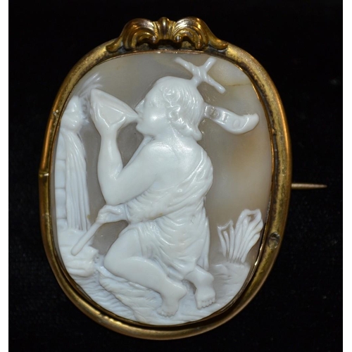 3157 - A 19th century Victorian carved shell cameo brooch, irregular rounded panel carved with a kneeling f... 