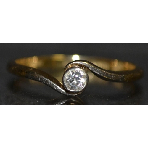 3166 - A diamond solitaire ring. approx 0.10ct, scrolled twisting shoulders, platinum crown, 18ct gold shan... 