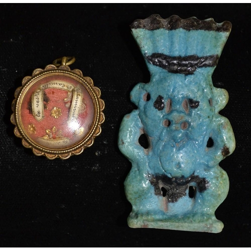 3167 - A 19th century Italian reliquary pendant, glazed front, reverse inset with a white metal S Camille D... 