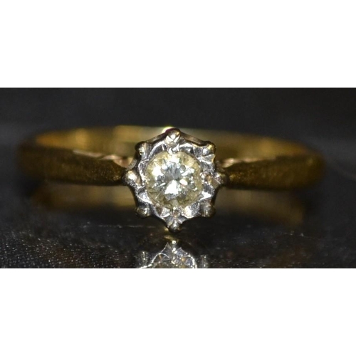 3168 - A diamond solitaire ring, round brilliant cut diamond, approx 0.10ct, illusion set shoulders, size K... 