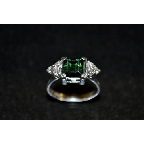 3411 - An Art Deco style emerald and diamond and white sapphire ring, central rectangular deep green emeral... 