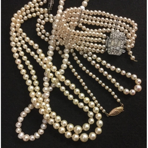 3412A - A single strand cultured pearl necklace, 14ct gold clasp, 47cm long; another silver clasp, 35cm long... 