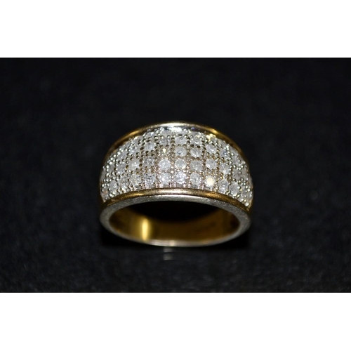 3420 - A diamond cluster ring, pave diamond encrusted tapering platform, total estimated diamond weight app... 