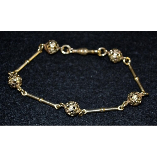 3427 - A 9ct rose gold fancy link Ball & Bar bracelet, stamped 375, Sheffield 1998, 9g gross