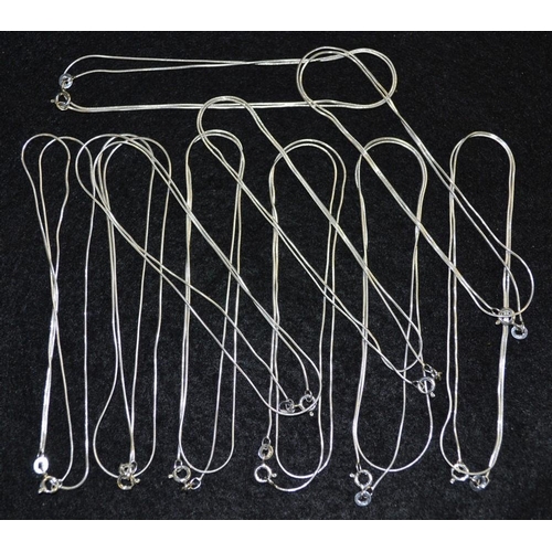 3446 - A 925 silver snake chain, stamped 925, 44cm long; others, conforming (10)