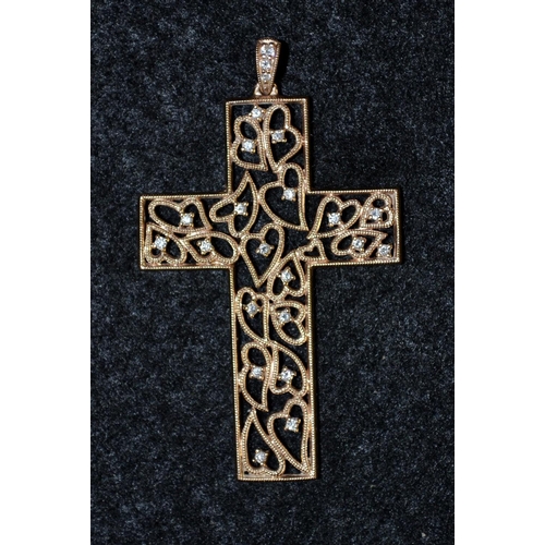 3450 - A diamond and rose gold cross pendant, open work interconnected hearts cross, encrusted with twenty ... 