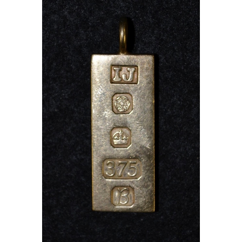 3451 - A 9ct gold rectangular ingot, Sheffield 1976, 30.4g