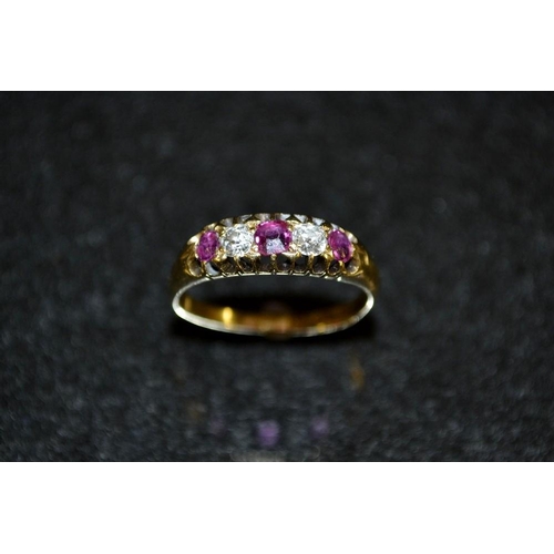 3461 - A Victorian five stone diamond and ruby ring, alternate set with three red ruby's and two old cut di... 