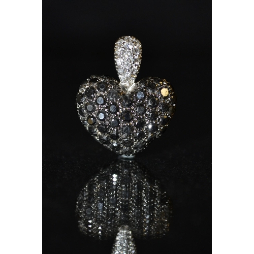 3474 - A Chopard diamond and coloured black diamond pendant, the heart-shaped pendant pavé-set with black d... 