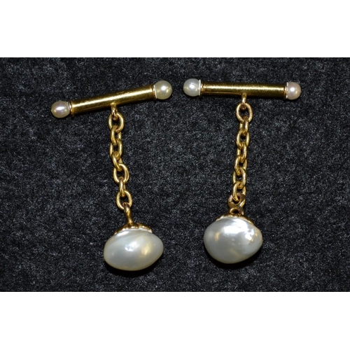 3476 - A pair of pearl mounted yellow metal cufflinks, indistinctly marked, 6.7g gross