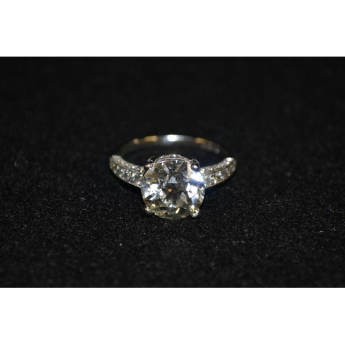 3491 - An impressive diamond solitaire ring, round brilliant cut, diamond weight approx 3.79ct, quarter cla... 