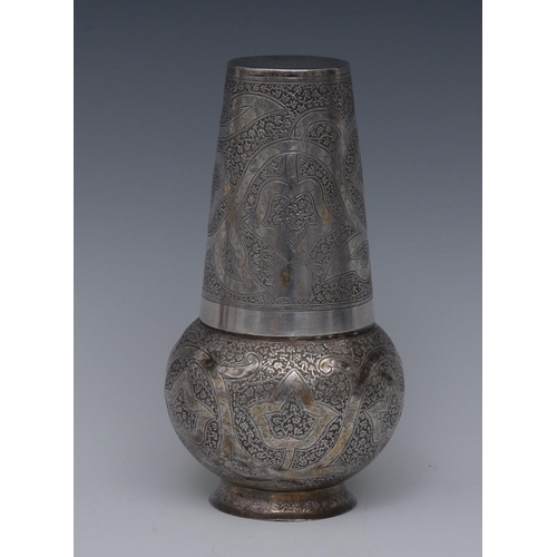 28 - A 19th century Indian silver ovoid water flask and tapered cylindrical beaker, profusely chased with... 