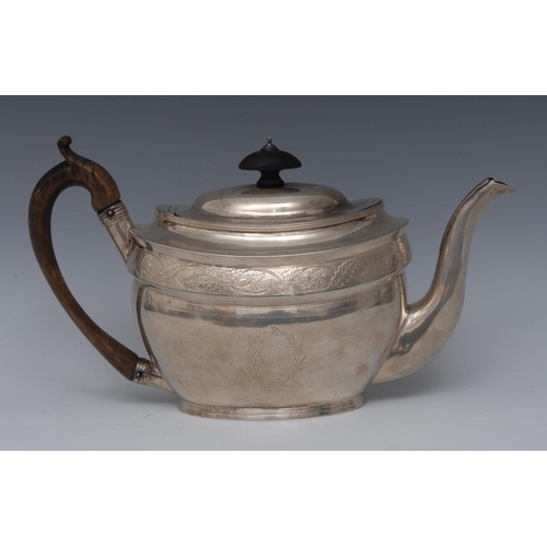 68 - A George III silver oval teapot, knop finial, flush-hinged domed cover, bright-cut engraved with a b... 