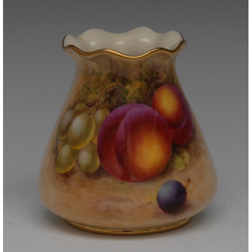 282 - A Royal Worcester vase, wavy rim, painted by Freeman, signed, with ripe peaches and grapes on a moss... 