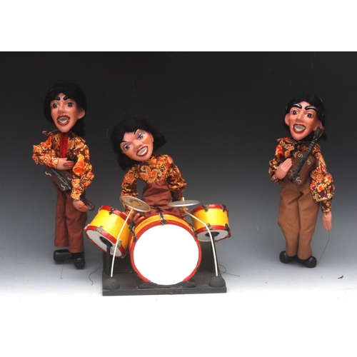 168 - SL Pop Group -  two Guitarist, drummer and drum kit, Pelham Puppets SL Range, moulded  heads,  black... 