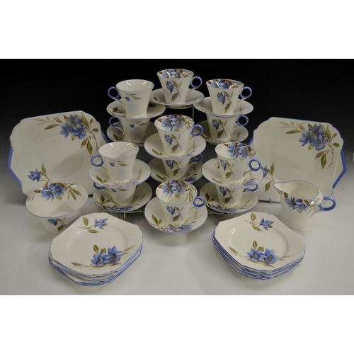 3113 - A Shelley Regency tea service, comprising of teacups, saucers, side plates, two bread and butter pla... 