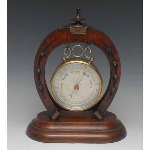 1564 - A late Victorian oak novelty aneroid mantel barometer, 11cm circular silvered register inscribed Cur... 