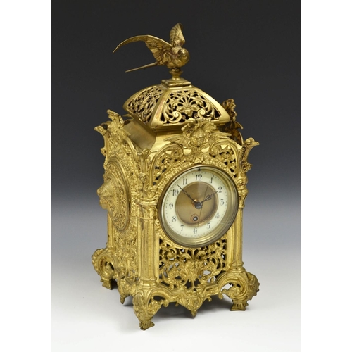 1581 - A French gilt metal mantel timepiece, 9.5cm circular dial with enamel chapter of Arabic numerals, si... 