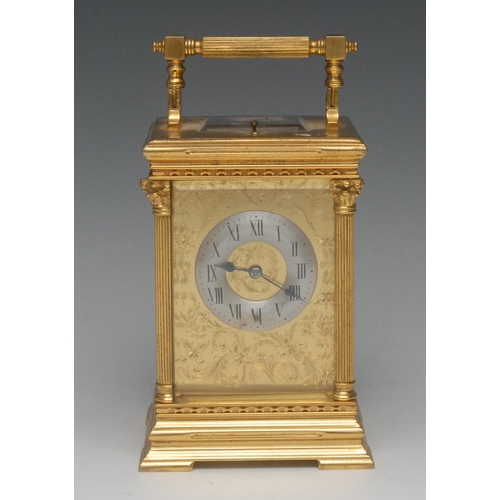 1588 - A late 19th century gilt brass repeating carriage clock, 5cm silvered convex chapter ring  inscribed... 