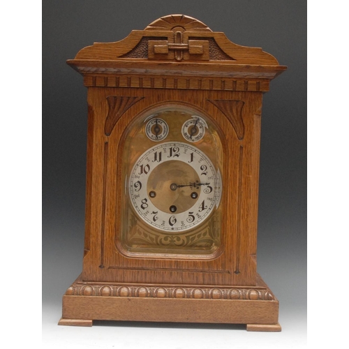 1590 - A late 19th century oak musical bracket clock, 16cm brass dial with silvered chapter ring inscribed ... 