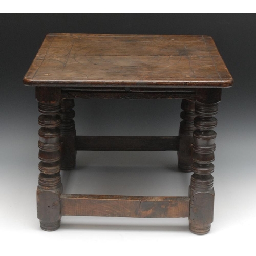 1631 - A '17th century' oak joint stool, the rounded over sailing top marked out with concentric circles an... 