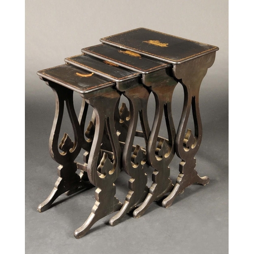 1637 - A 19th century quartetto nest of black lacquered tables, the tops decorated in gilt with sailing ves... 