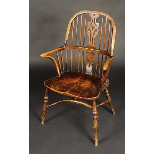 1642 - A 19th century ash and elm Windsor armchair, hooped stick back with shaped and pierced splat, saddle... 