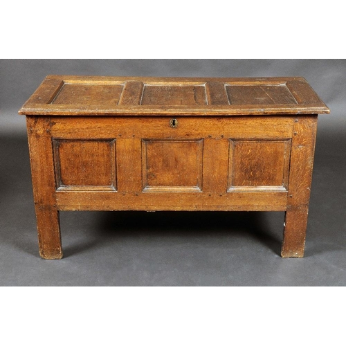 1663 - A Charles II oak three panel blanket chest, hinged top, stile feet, 68cm high, 117cm wide, c.1675