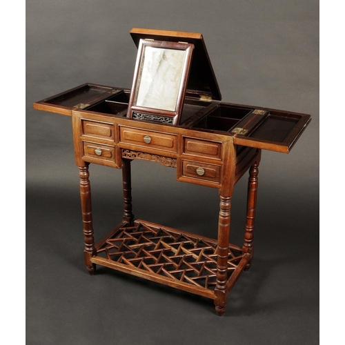 1665 - A Chinese padouk wood dressing table, the hinged three section top enclosing a folding mirror, lift ... 