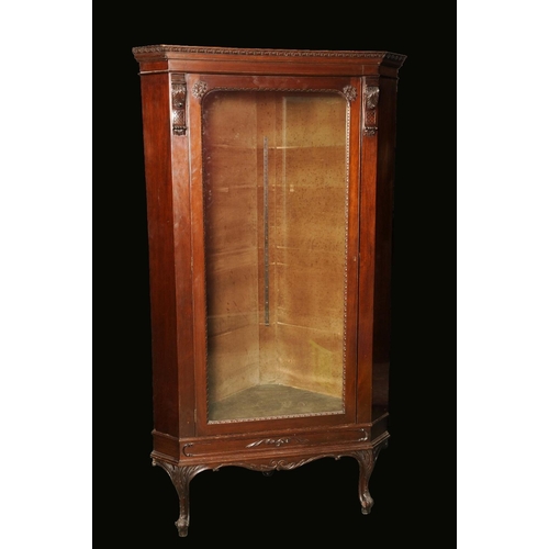 1670 - A Chippendale Revival mahogany splay fronted floor standing corner cupboard, moulded outswept cornic... 