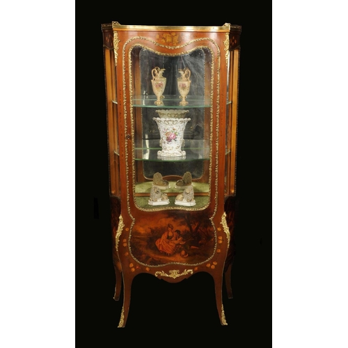 1687 - A French Louis XV style gilt metal mounted vernis Martin serpentine vitrine, pierced three-quarter g... 