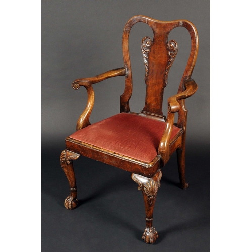 1691 - A George II style walnut elbow chair, shaped splat carved with acanthus scrolls, drop-in seat, cabri... 