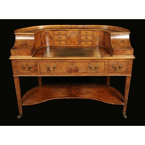 1692 - A George III crossbanded mahogany Carlton House desk, typical swept superstructure with an arrangeme... 