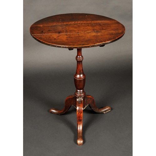 1694 - A George III fruitwood circular tripod occasional table, tilting top, turned vasular column, cabriol... 