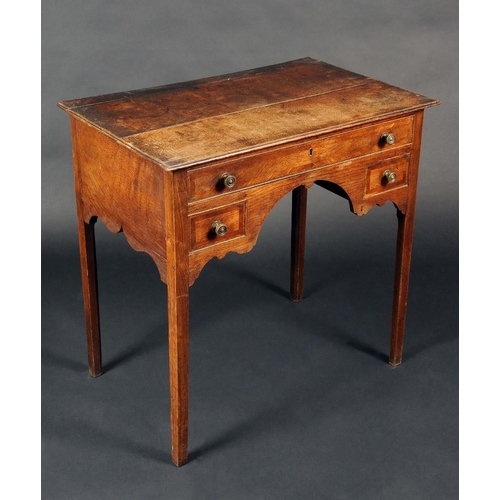 1721 - A George III oak lowboy, rectangular moulded top above one long and two short cockbeaded drawers, br... 