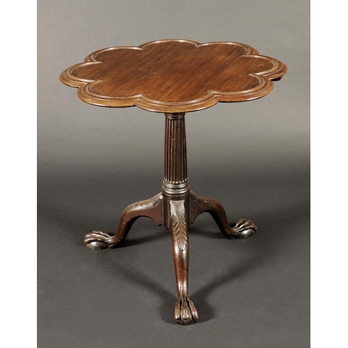 1726A - A George III mahogany Irish octofoil tripod supper table, dished tilting top, birdcage support, flut... 