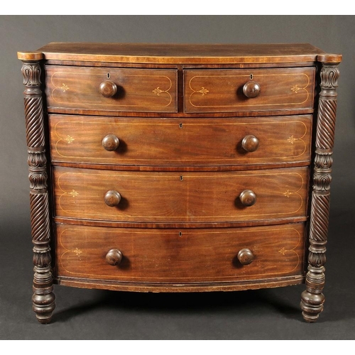 1734 - A George IV mahogany bow fronted chest, of two short and three long graduated cockbeaded drawers, in... 