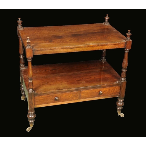 1743 - A 'George IV' rosewood rounded rectangular two-tier low whatnot, urnular finials, turned columns, th... 