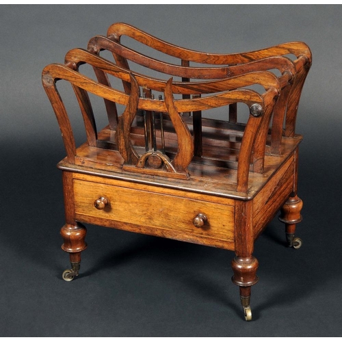 1744 - A George IV rosewood three-section Canterbury, curved divisions centred by a lyre, drawer to base, t... 