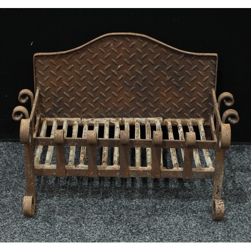 416 - A cast iron country house fire basket