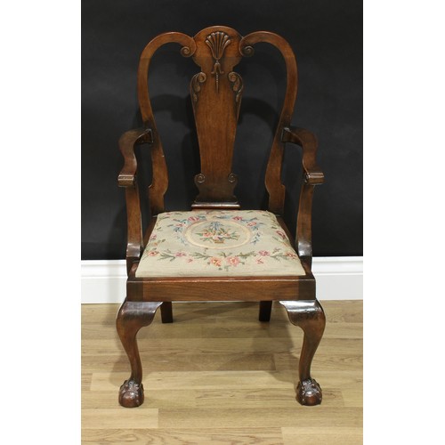 417 - A George I style mahogany child's armchair, shaped scroll back with vasular splat carved with a shel... 