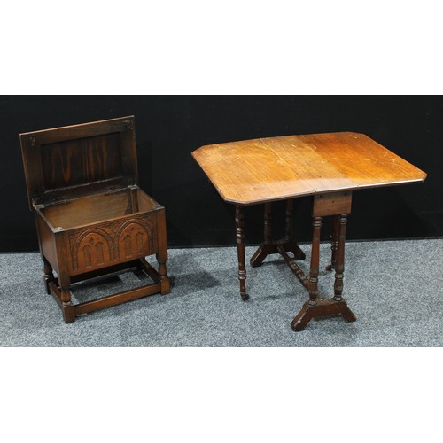 419 - A late Victorian Sutherland table, c.1890; a small carved oak chest (2)