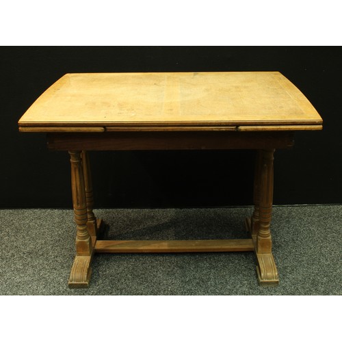 415 - An oak refectory type draw-leaf dining table