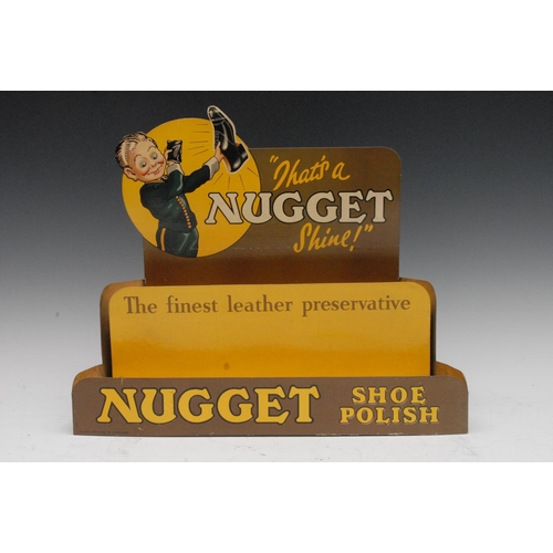 1050 - Nugget Shoe Polish - an early 20th century cardboard promotional shop display stand, printed in poly... 