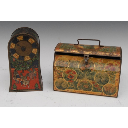 1079 - Jacob & Co - an early 20th century novelty bullet shaped tin/money box, printed with anthropomorphiz... 