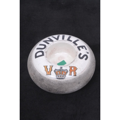 1082 - Dunville's - a Shelley match striker, inscribed in black and red Dunville's VR, 11cm diam, printed m... 