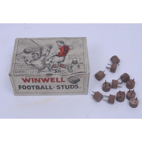 1089 - Football - an early to mid-20th century rectangular packet, Winwell Football Studs, with partial con... 